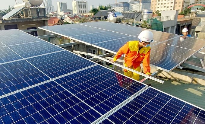 Workers installing solar rooftop