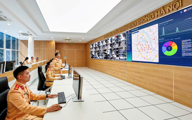 Officers work at the Hanoi Smart Traffic Control Center